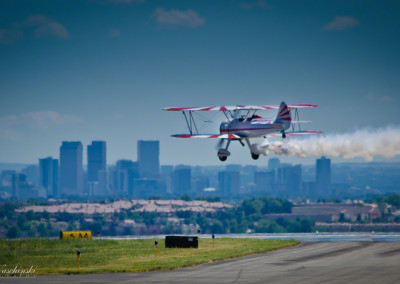 Gary Rower's Stearman over Denver