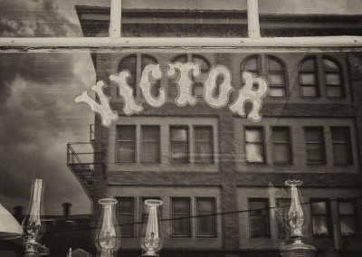 Photo of Victor Colorado Street Reflection in Store Window B&W