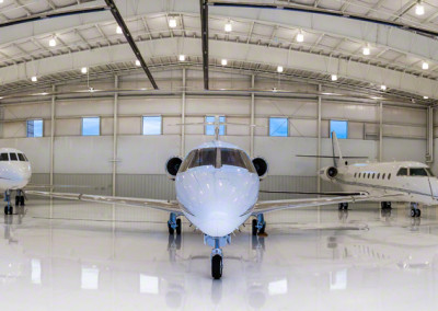 Panoramic View of Charter Jets in Hangar