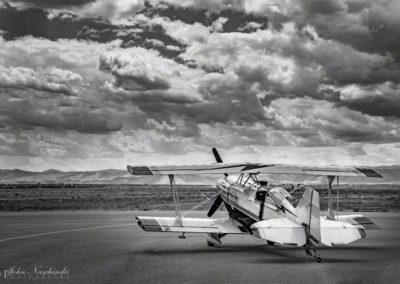 Buck Roetman's Pitts at the Rocky Mountain Air Show B&W