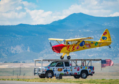 Jelly Belly Stunt Plane Touchdown Landing on Truck 01