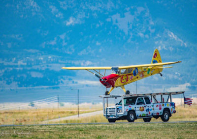 Jelly Belly Stunt Plane Taxing with Truck on Runway 01