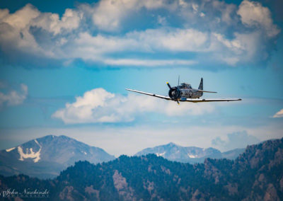 Photo of North American T-6 Texan over Rocky Mountains 01