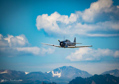 Photo of North American T-6 Texan over Rocky Mountains 02