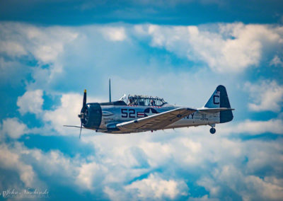 Photo of North American T-6 Texan in Flight over Colorado Skies 22