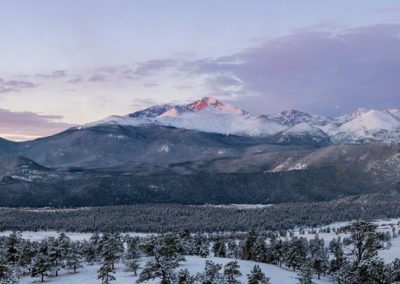 Panoramic Photo of First Light over Snow Capped Longs Peak Range in RMNP