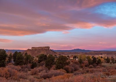 Purple Pink Blue and Yellow Colors of Sunrise Reflect off Shelf Cloud Castle Rock CO