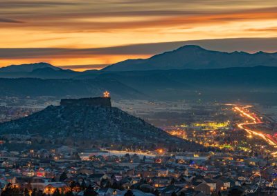 The Sun Sets as the Star Shines Above the City of Castle Rock