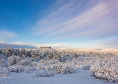 After Fresh Snow with Blue Sky and Wind Swept Clouds over Castle Rock