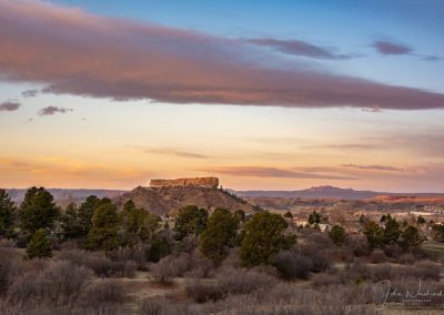 Warm Colors in Clouds over Castle Rock at Sunrise