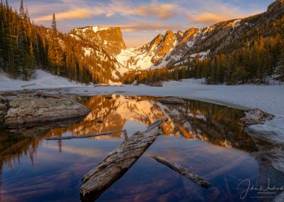 Photo of Partially Frozen Dream Lake Reflecting Hallett Peak RMNP