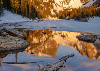 Photo of Hallett Peak & Dream Lake Drift Wood Reflections