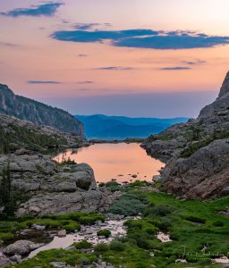 Vertical Photo of Pink Purple Light over Lake of Glass RMNP