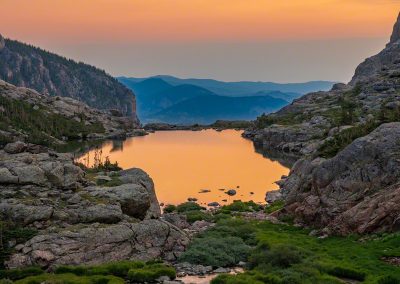 Vertical Photo of Colorful Sunrise Reflecting Upon Lake of Glass RMNP
