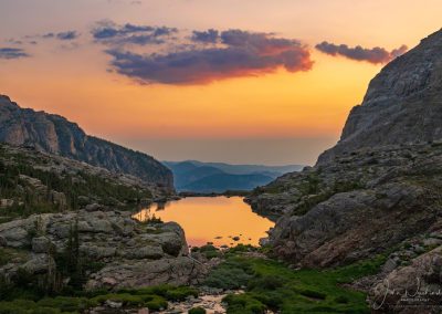 Amazing Sunrise Illuminating Clouds and Reflecting Upon Lake of Glass RMNP