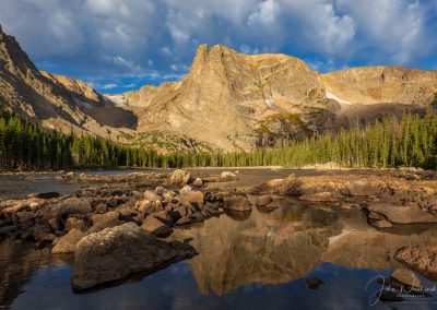 Dramatic Light and White Clouds Over Notchtop Mountain and Two Rivers Lake Rocky Mountain National Park