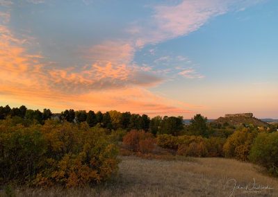 Colors of Sunrise Mimic Fall Colors in this Photo of Castle Rock CO