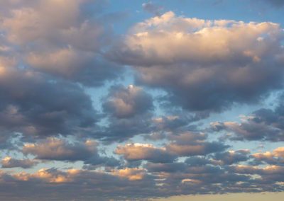 Vertical Photo fo Dramatic Popcorn Clouds at first Light on Fall Morning in Castle Rock Colorado