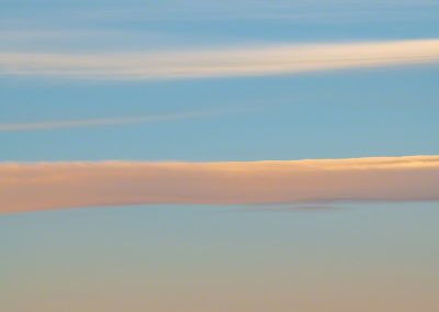 Vertical Photo of Bow Cloud over Castle Rock at Sunrise