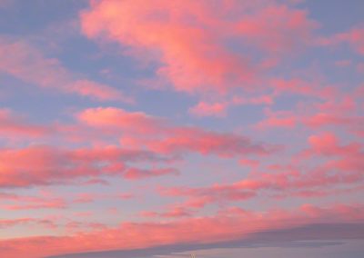 Vertical Photo of Dramatic Pink Clouds over the Castle Rock Star with Autumn Snow