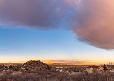 Wide Panoramic Photo of Castle Rock's "Rock" from High Bluff with Colorful Clouds Above