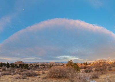 Panoramic Photograph of Wild Shelf Cloud above Castle Rock at Sunrise