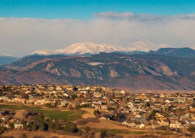 Photo of Snow Capped Mt Evans as a Backdrop to Red Hawk Ridge Neighborhood in Castle Rock CO