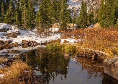 Photo of Hallett Peak Reflecting in Alpine Tarn fed by Dream Lake run off