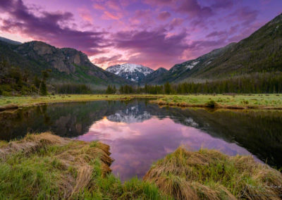 Purple Sunrise over Snow Capped Mt Baldy Reflecting upon still waters of the East Inlet RMNP