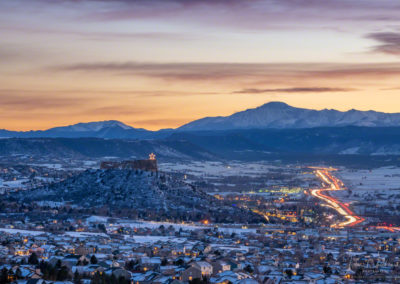 Castle Rock Star, Cars on I-25 and Pikes Peak at Sunset