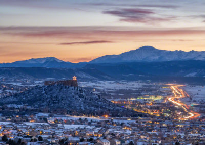 Sunset photo of Castle Rock Star, Cars on I-25 and Pikes Peak