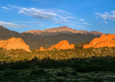White Clouds Blue Skies over Pikes Peak and Garden of the Gods at Sunrise