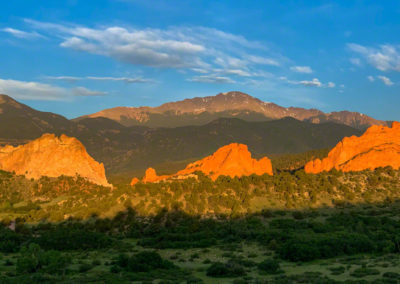 White Clouds & Blue Sky Panoramic Photo of Pikes Peak and Garden of the Gods at Sunrise
