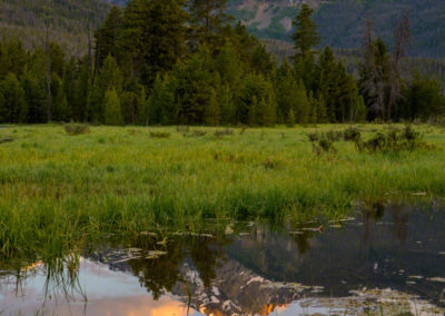 Peak of Baker Mountain Reflecting in Pond at Rocky Mountain National Park