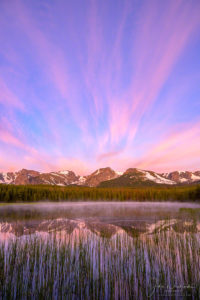 Vertical Photo of Pink Clouds over Biersradt Lake RMNP Colorado at Sunrise