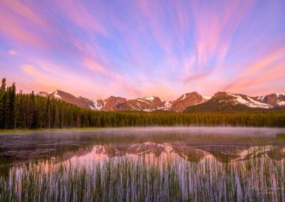 Low lying fog and Pink Clouds over Biersradt Lake RMNP Colorado at Sunrise