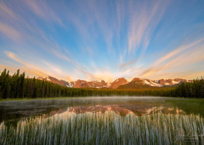 Photo of low lying fog and high wind blown clouds over Biersradt Lake at Sunrise