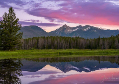 Magenta Pink Light Over Baker Mountain Reflecting on Small Pond in the Kawuneeche Valley RMNP