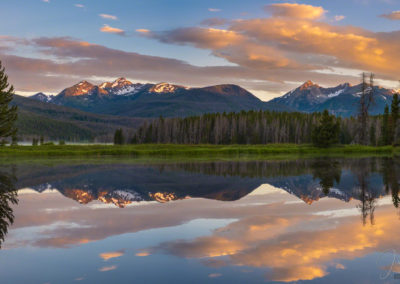 Panoramic Photo of Warm Sunrise Illuminating Bowen & Baker Mountain with Reflection of Never Summer Range on a Still Pond in Kawuneeche Valley, RMNP Colorado