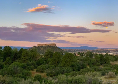 Photo of Full Moon at Sunrise over Castle Rock Colorado