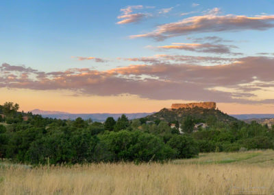 Photo of Beautiful Pastel Sunrise over Castle Rock CO with Pikes Peak