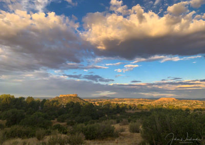Photo of First Light and Dramatic Clouds over the Rock - Castle Rock CO
