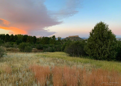 Vibrant Clouds at Sunrise over Castle Rock