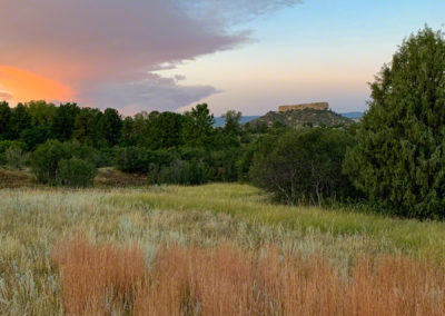 Vertical Photo of Vibrant Clouds at Sunrise over Castle Rock