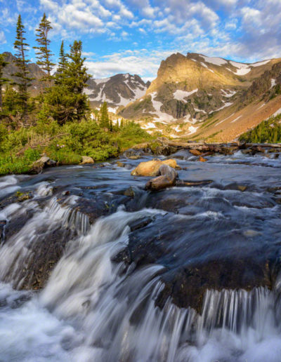 Photo of White Puffy Clouds Above Peaks in Indian Peaks Wilderness, taken from Lake Isabelle Outlet Stream