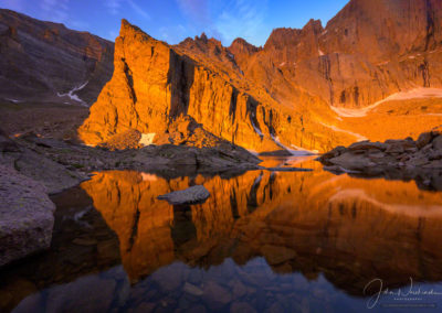 Dramatic Light Illuminating Ship's Prow Rock Chasm Lake Rocky Mountain National Park Colorado