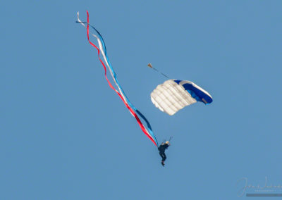 US Air Force Wings of Blue Parachute Demonstration Team member with Red, White and Blue Streamers