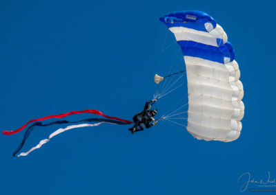 US Air Force Wings of Blue Parachute Demonstration Team Member Swooping by at Pikes Peak Airshow