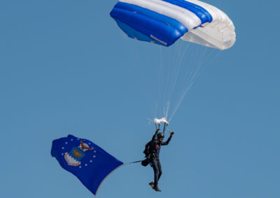 US Air Force Wings of Blue Parachute Team Member Flying the Colors for the US Air Force