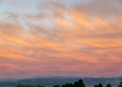 Warm Colors and Wispy Clouds over the Colorado Front Range at Sunrise